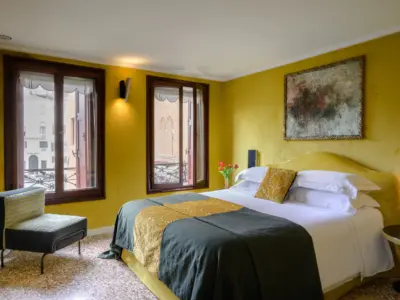 C4 Casetta Rossa gold bedroom with view