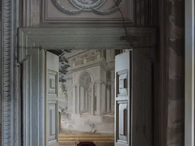 Villa Balbiano luxury best private exclusive property villa 17 century Lake Como Milan famous suites bedrooms interiors service antique armchair living room original frescos