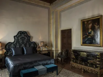 Villa Balbiano best accommodation on lake Como exclusive rentals first floor blue master suite bedroom japanese black coromandel chest antique chinese chair painting of Saint Cecilia 19000 VB int
